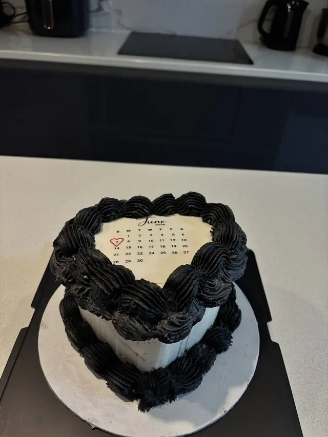 Black and white heart cake with calendar design
