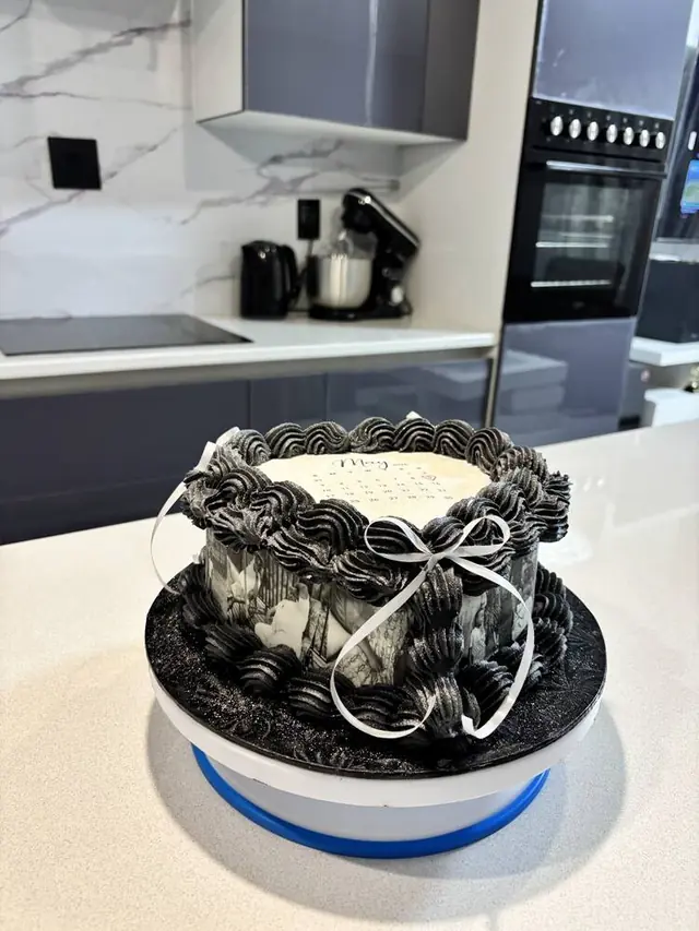 Two-tier black and white photo heart cake