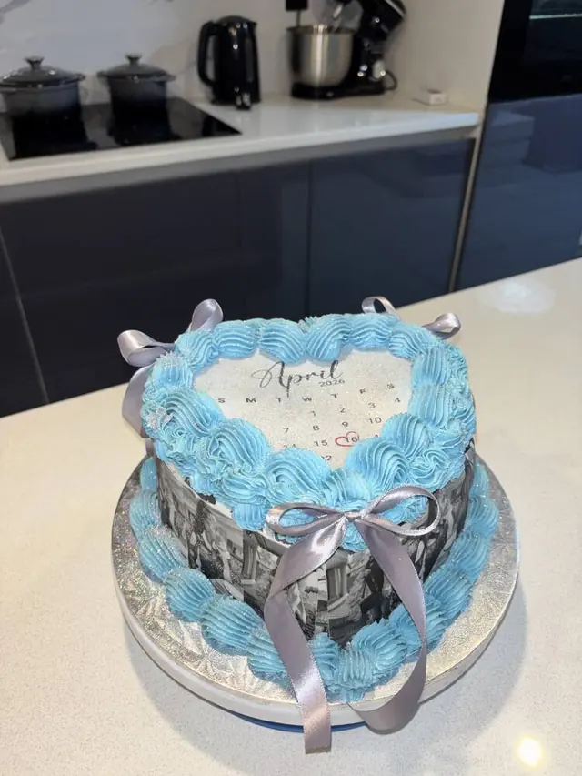 Blue heart cake with photo tier and silver ribbon