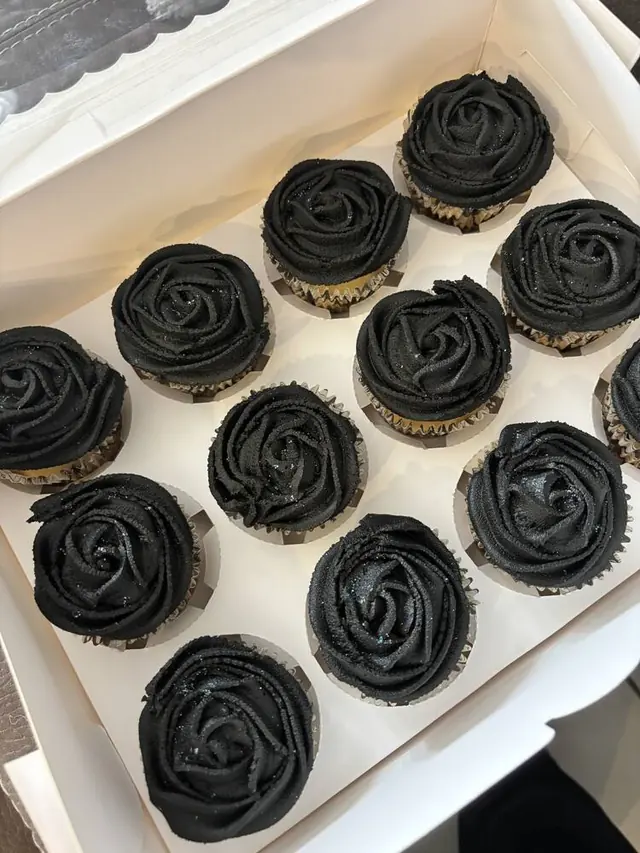 Black glitter rose cupcakes in a box