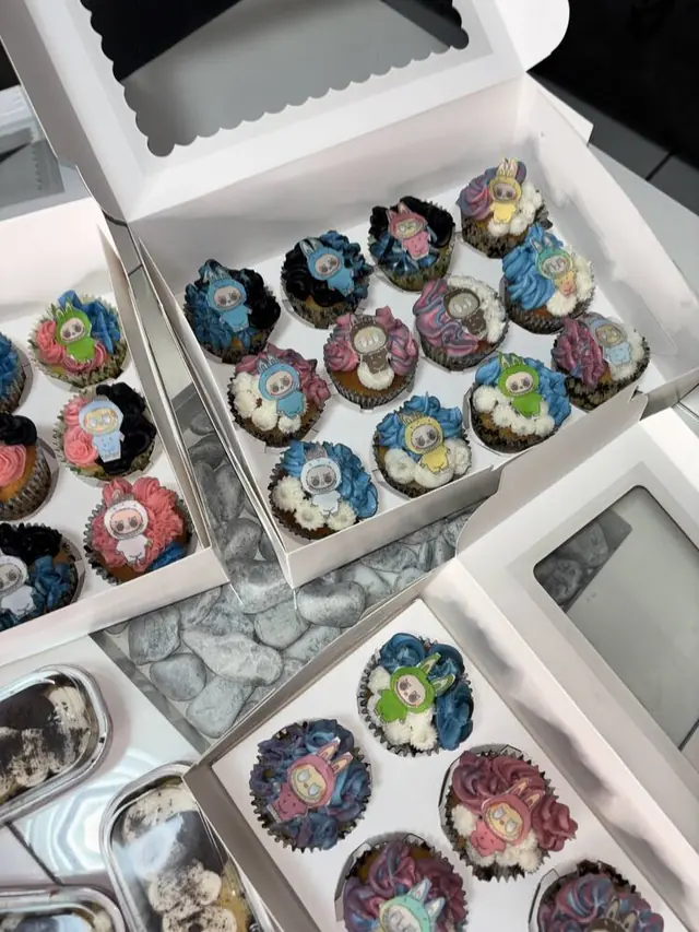 Bunny character cupcakes in blue, pink and black